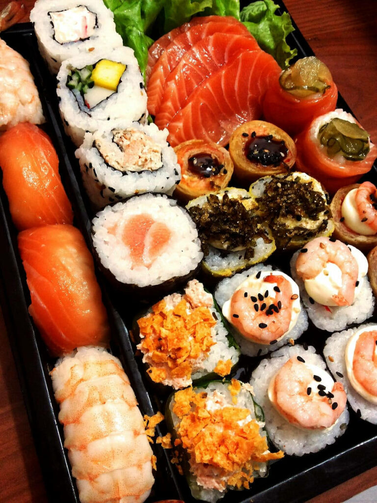 Vibrant Sushi Platter Wallpaper: Fresh Sashimi & Colorful Maki Rolls