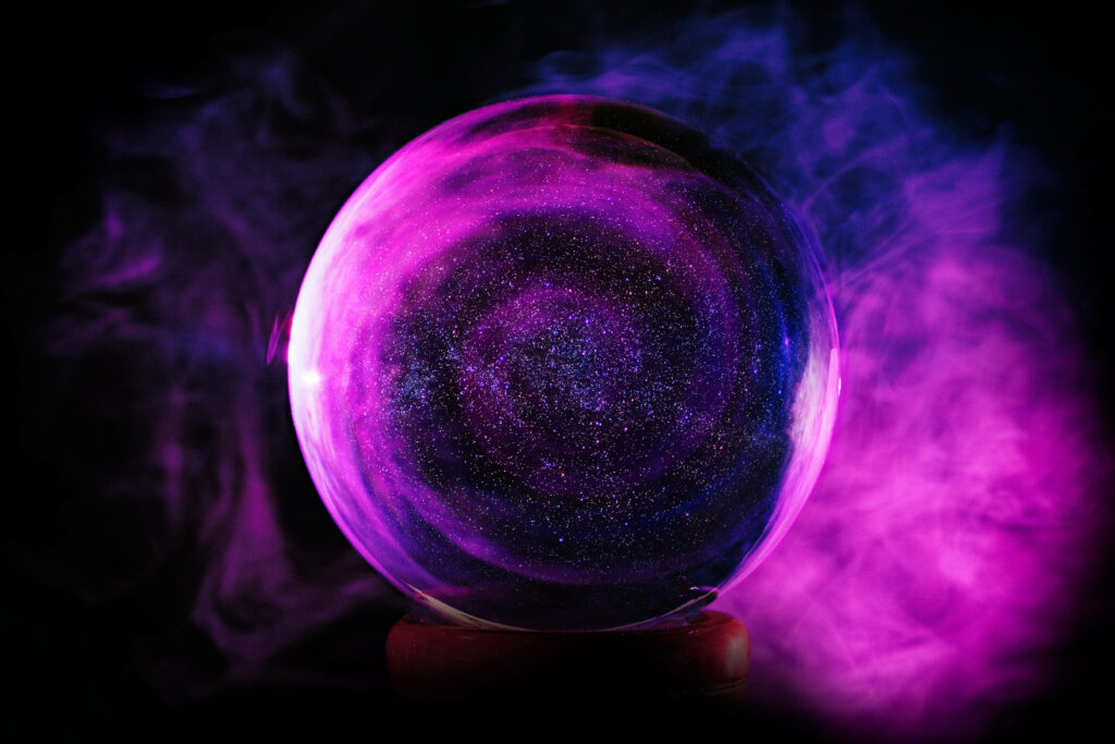 Violet crystal ball with swirling cosmic galaxy purple smoke neon hues dark space wallpaper