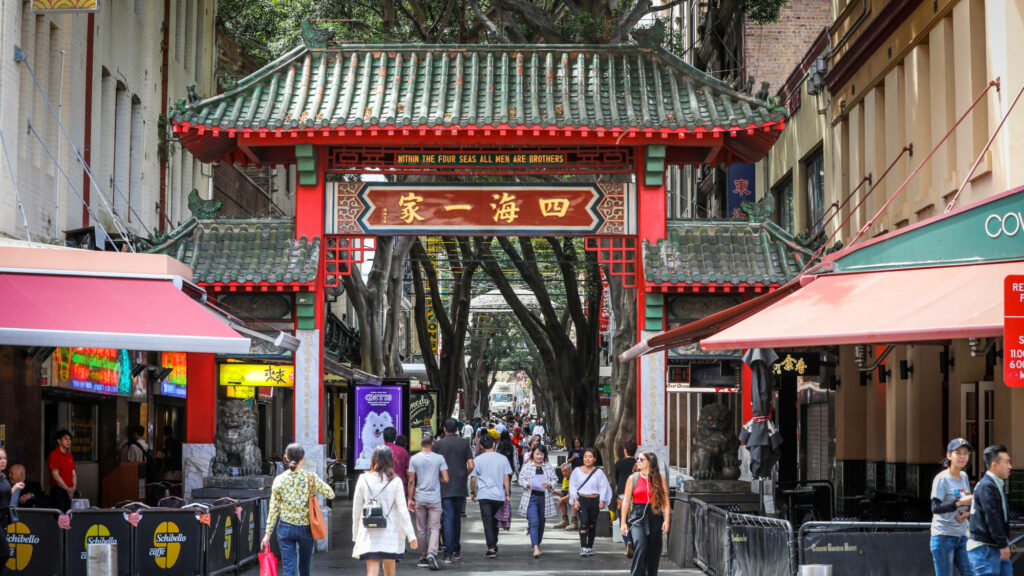 Sydney Chinatown Market vibrant street scene with traditional gate colorful cultural blend wallpaper