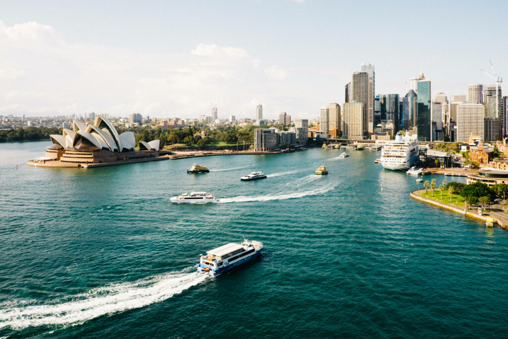 Vibrant Sydney Harbour Wallpaper: Ferries & Opera House Skyline