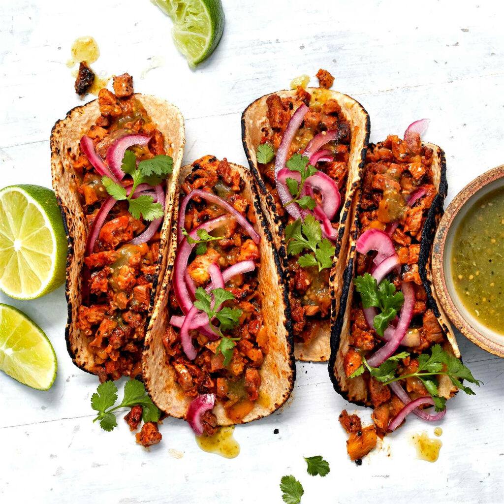 Vibrant Taco al Pastor Wallpaper: Savory Pork & Fresh Cilantro Design