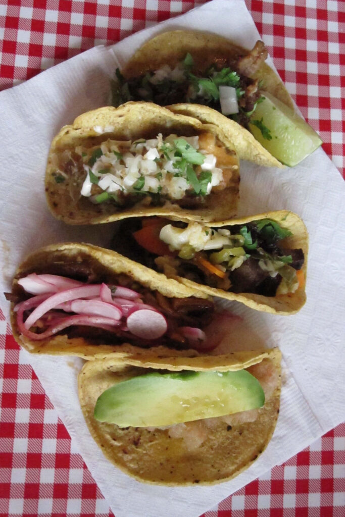 Vibrant Taco iPhone Wallpaper: Fresh Ingredients on Checkered Tablecloth