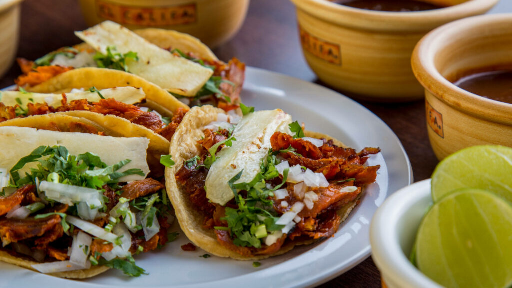 Vibrant Taco Al Pastor Wallpaper: Flavorful Meat & Citrus Burst