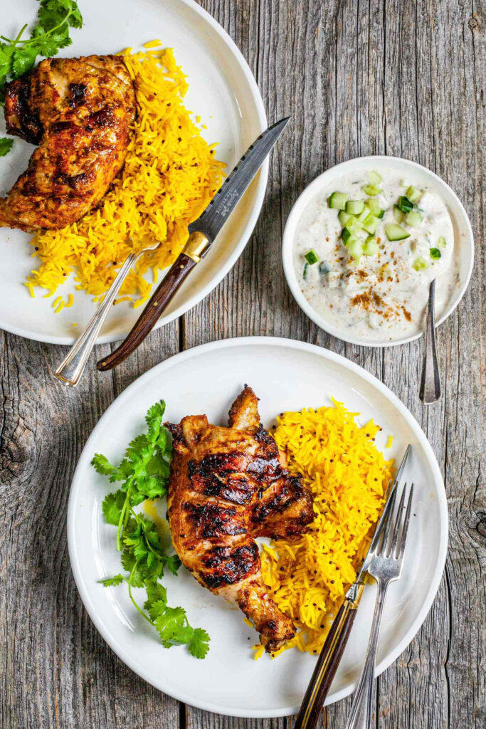 Vibrant Tandoori Chicken & Yellow Rice Wallpaper Background