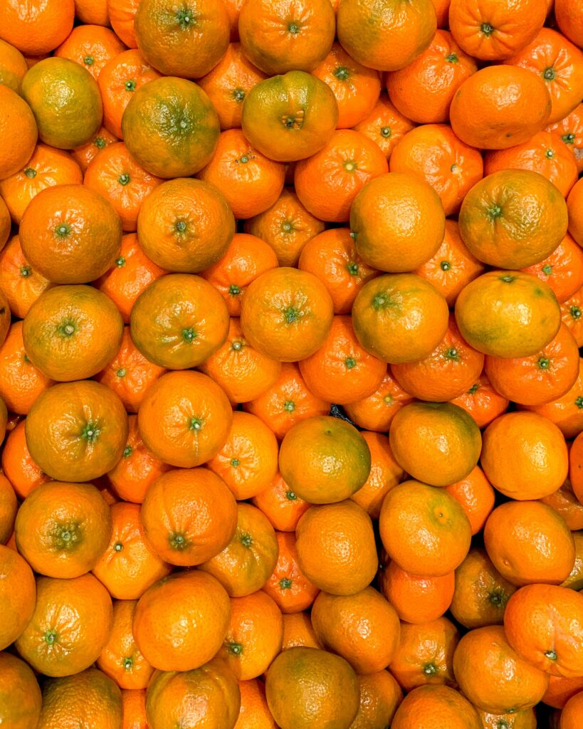 Vibrant Tangerine Wallpaper: Bright Citrus Texture Background