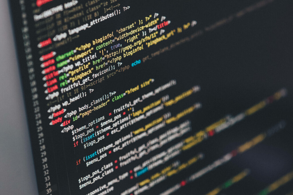 Vibrant Programming Code Wallpaper on Dark Background - Tech Essence