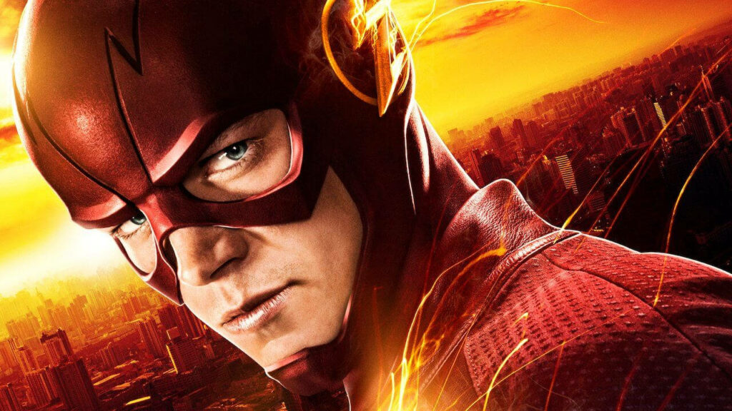 Vibrant Flash Wallpaper: Iconic Red Suit & Cityscape Background