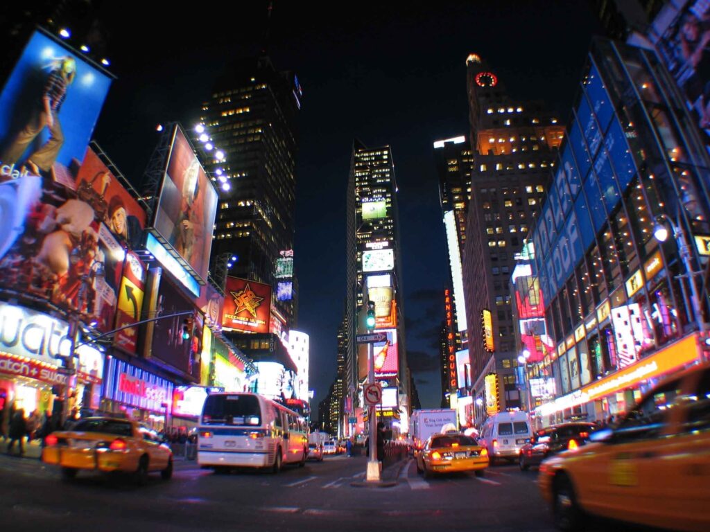Vibrant Times Square Night Wallpaper: Colorful Lights & Energy