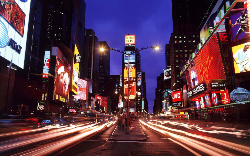 Vibrant Times Square Night Wallpaper Background with Colorful Lights