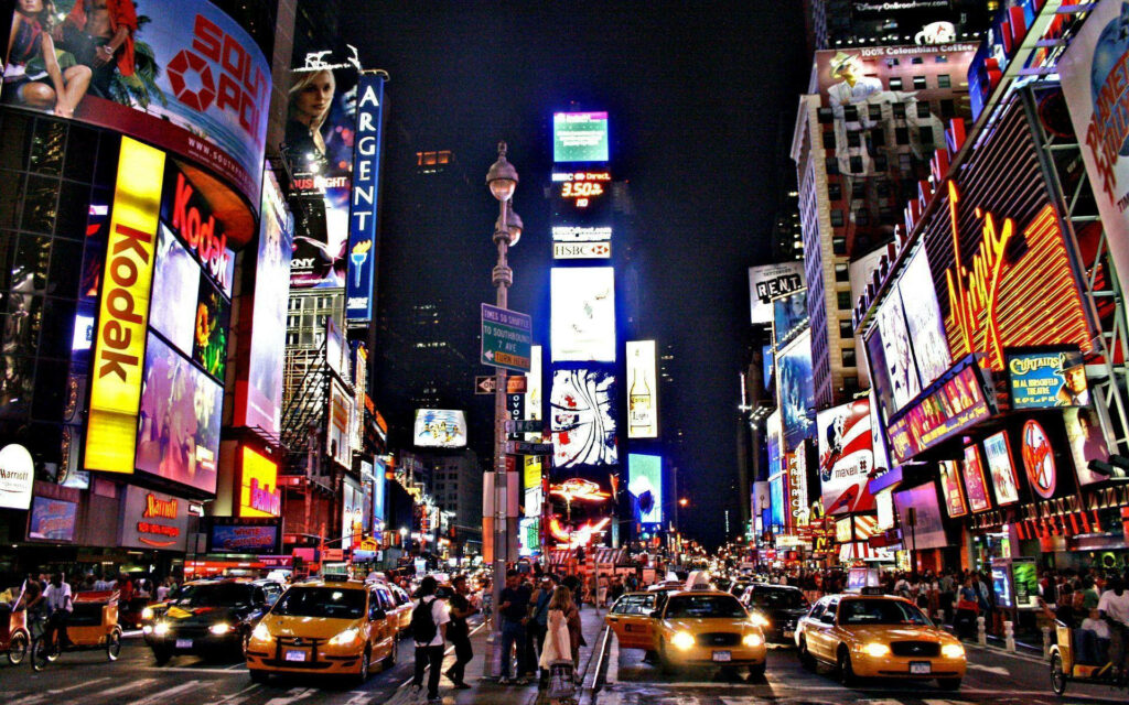 Vibrant Times Square Night Wallpaper: Illuminated Billboards & Taxis