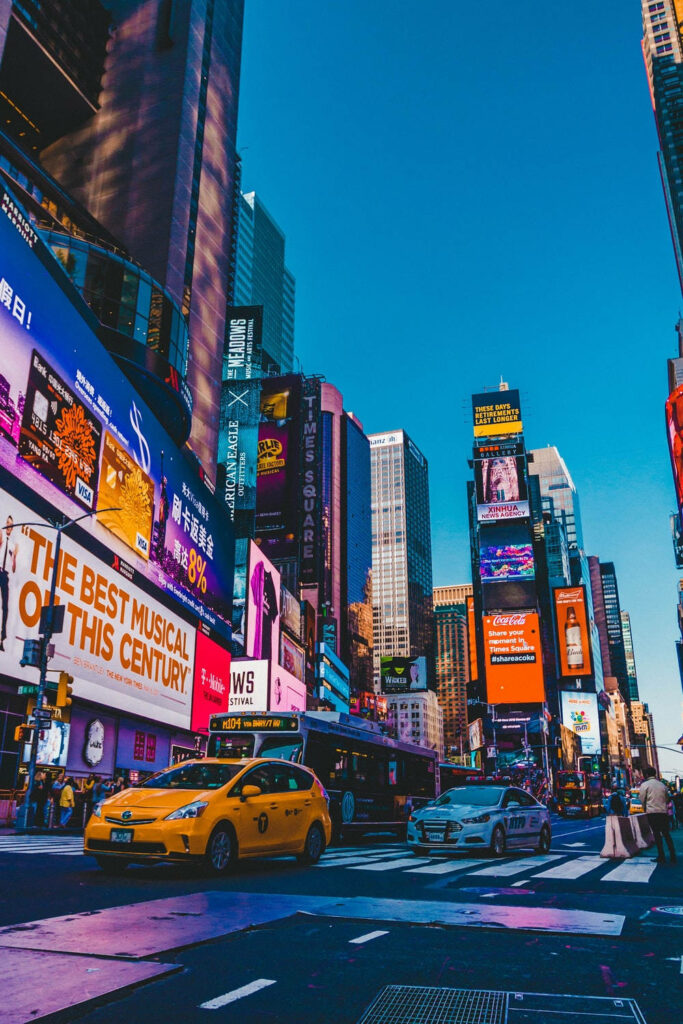 Vibrant Times Square Wallpaper: Colorful Ads & Yellow Cabs
