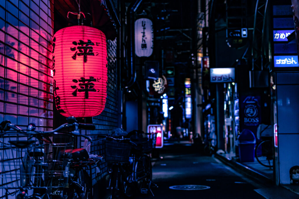 Vibrant Tokyo Night Scene: Neon Signs & Lanterns Wallpaper Background