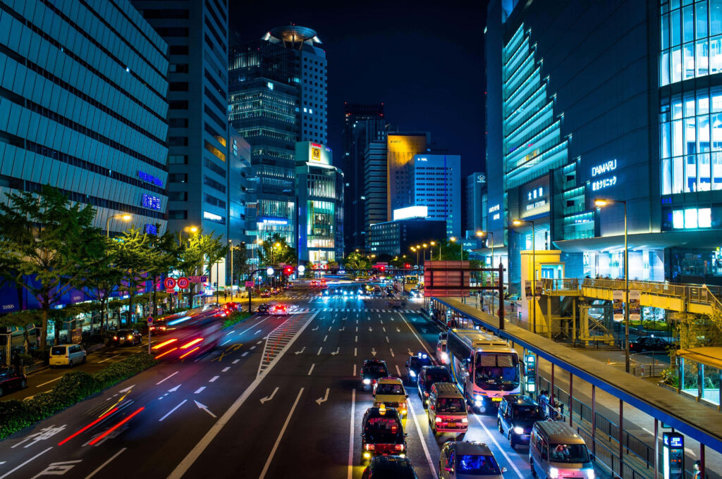 Vibrant Tokyo Nighttime Cityscape Wallpaper Background - Urban Delight