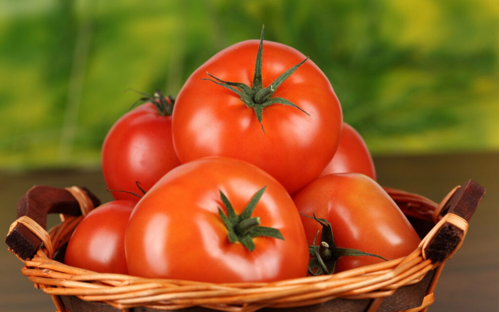 Vibrant Tomato Wallpaper: Fresh Red Fruits in Woven Basket