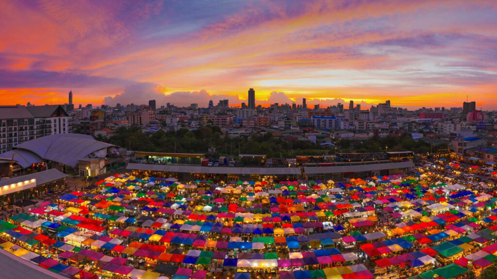 Vibrant Sunset at Train Night Market Ratchada - Colorful Stall Wallpaper