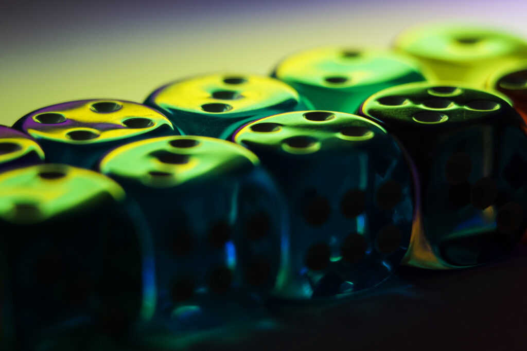 Vibrant Wallpaper: Translucent Dice with Glowing Green & Yellow Tones