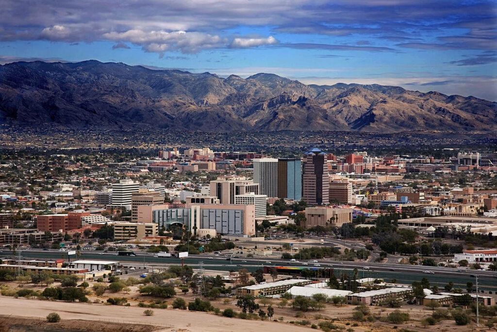 Vibrant Tucson Cityscape Wallpaper: Modern Architecture & Majestic Mountains