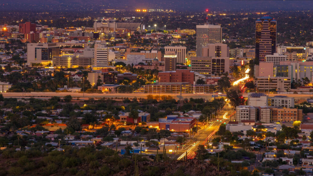 Tucson Nighttime View: Vibrant City Lights & Serene Wallpaper Background