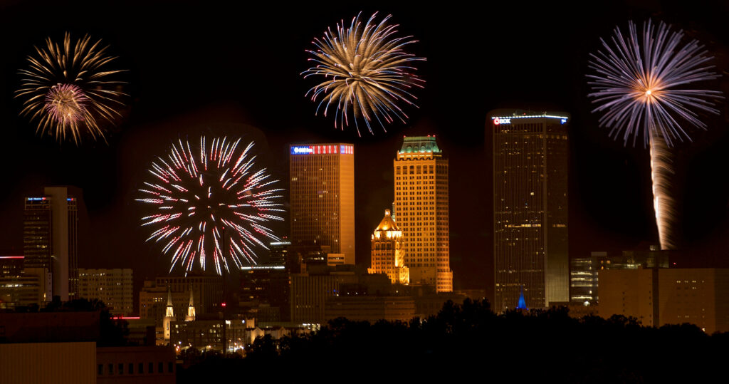 Vibrant Tulsa Skyline Night Wallpaper with Colorful Fireworks