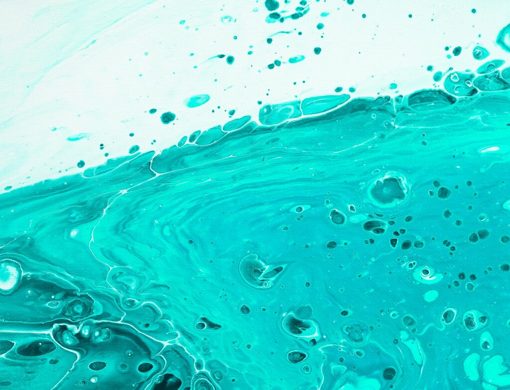 Vibrant Turquoise Liquid Paint Macro Art Wallpaper Background