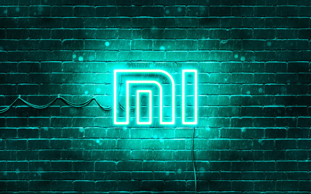 Xiaomi Neon Logo Pops Against Turquoise Brick Wall: 4K Wallpaper