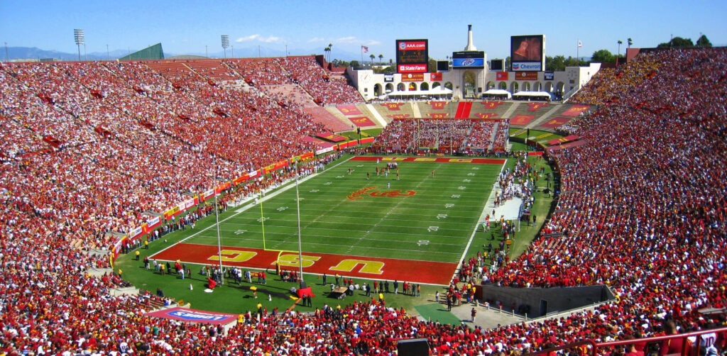 Vibrant USC Trojans Stadium Wallpaper: Enthusiastic Fans & Red Gold