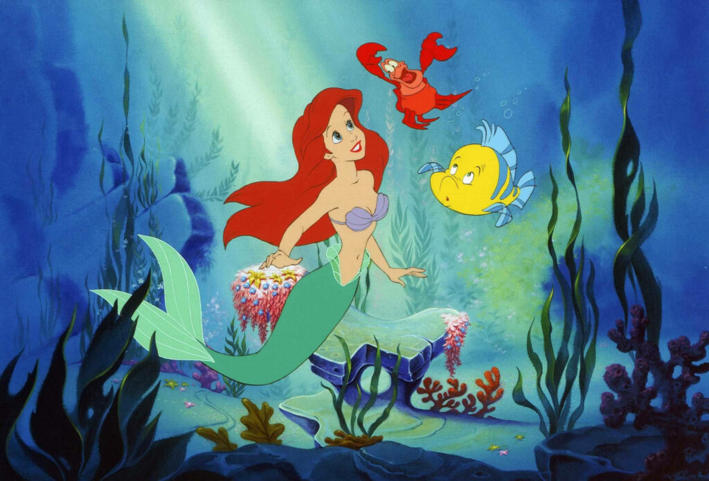 Vibrant Underwater Scene: Ariel, Sebastian & Flounder Wallpaper
