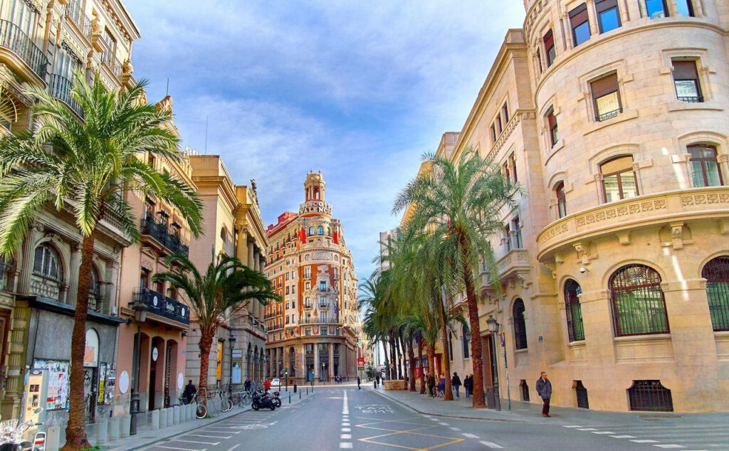 Vibrant Valencia Cityscape Wallpaper: Colorful Architecture & Palm Streets