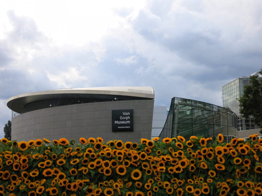 Vibrant Van Gogh Museum Wallpaper with Sunflowers & Modern Design