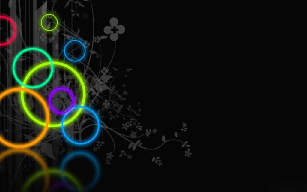 Vibrant Vector Wallpaper: Colorful Circles & Floral on Black Background