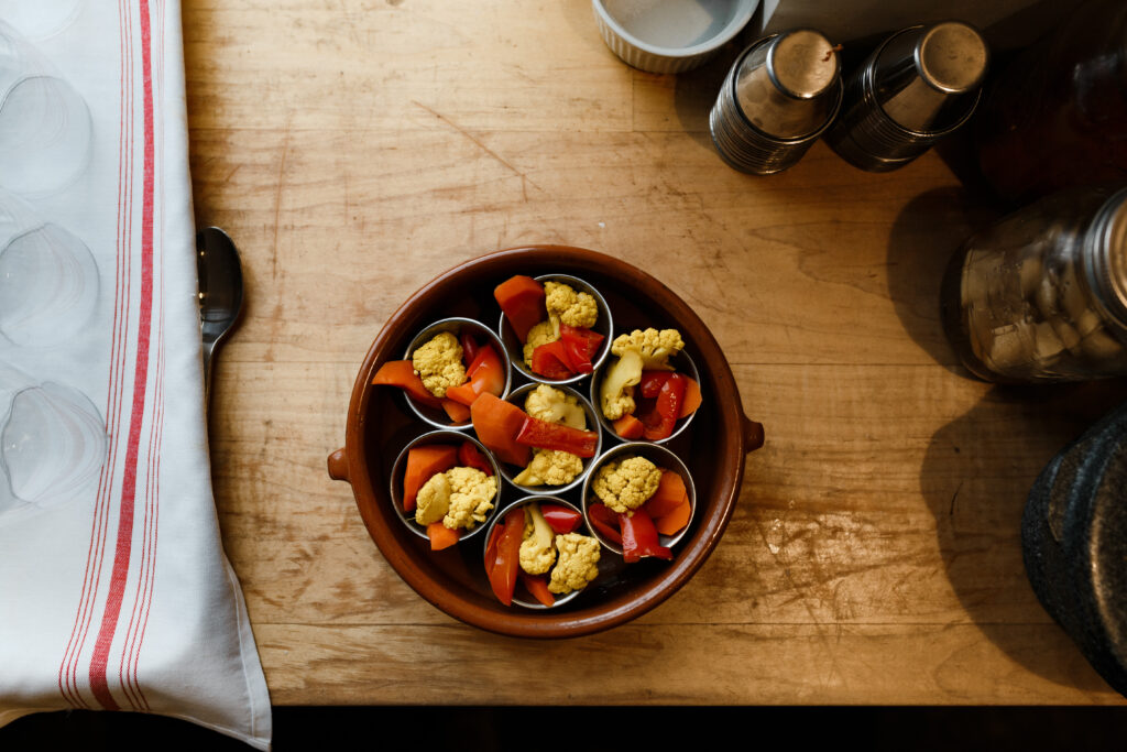 Colorful Vegetable Arrangement: Cauliflower, Peppers & Carrots Wallpaper