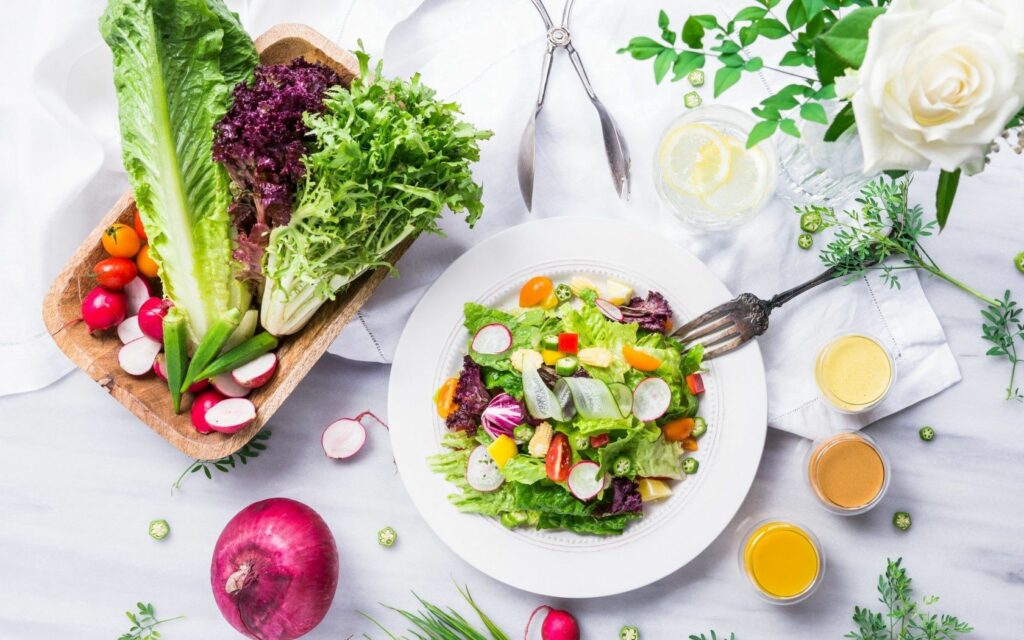 Vibrant Vegetable Wallpaper: Fresh Salad and Colorful Produce Display