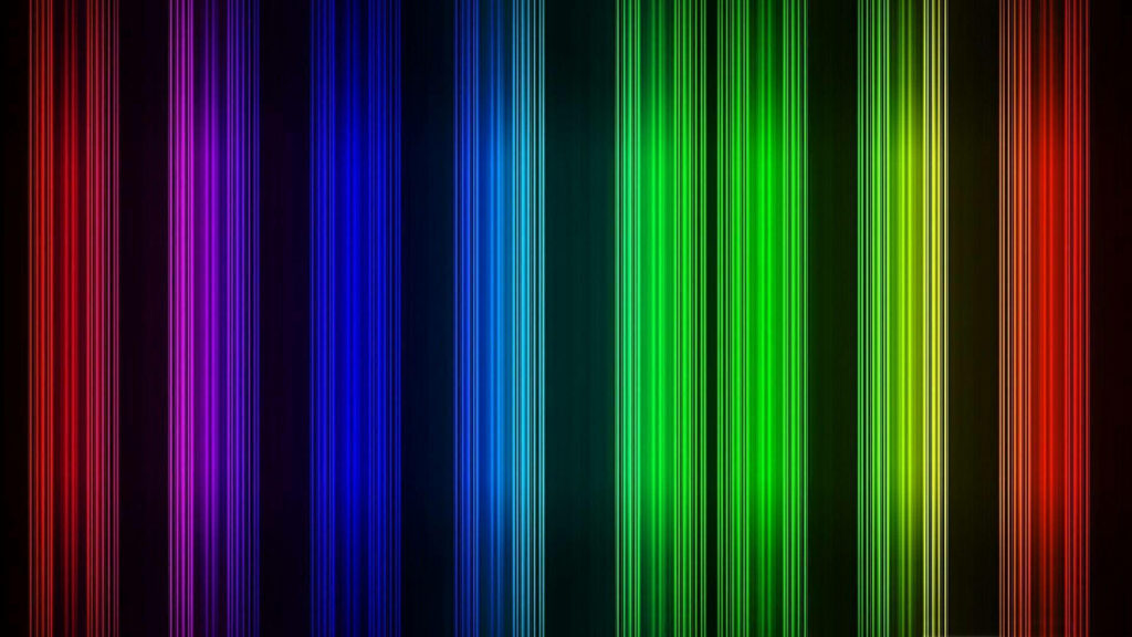 Vibrant Spectrum: Captivating Neon Rainbow Vertical Lines Illuminate a Digital Wonderland Wallpaper