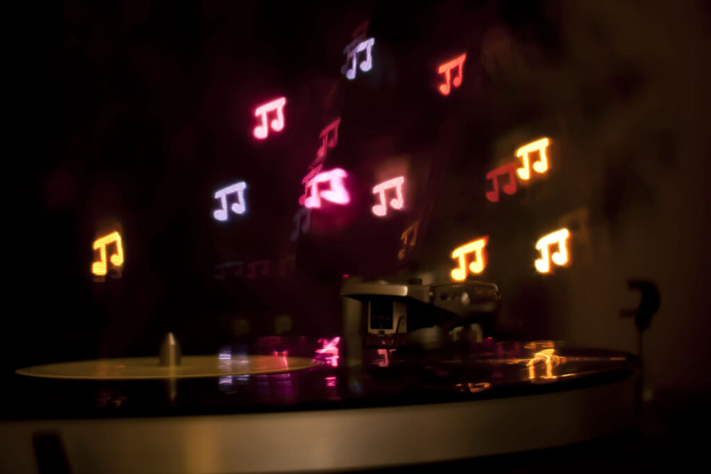 Colorful Vinyl Record Spin: Vibrant Wallpaper Background