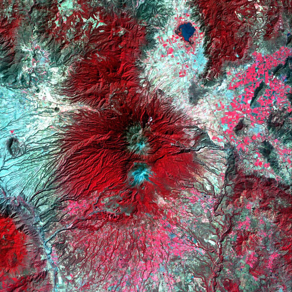 Vibrant Volcano Wallpaper: Stunning Satellite View in Red & Teal