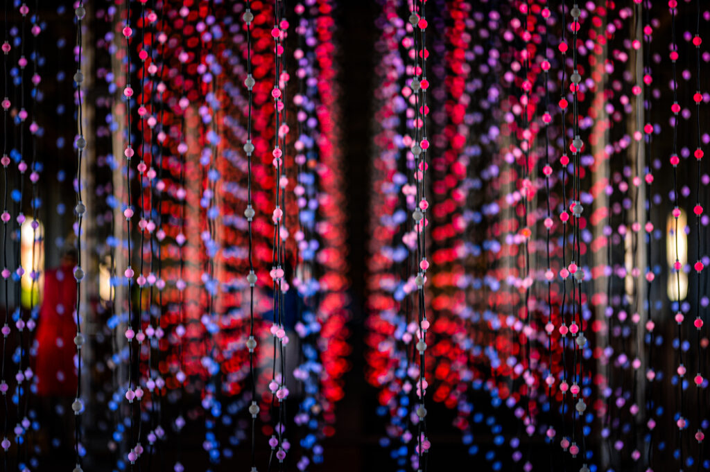 Vibrant Wallpaper: Colorful Light Bulbs Creating a Festive Blur Effect