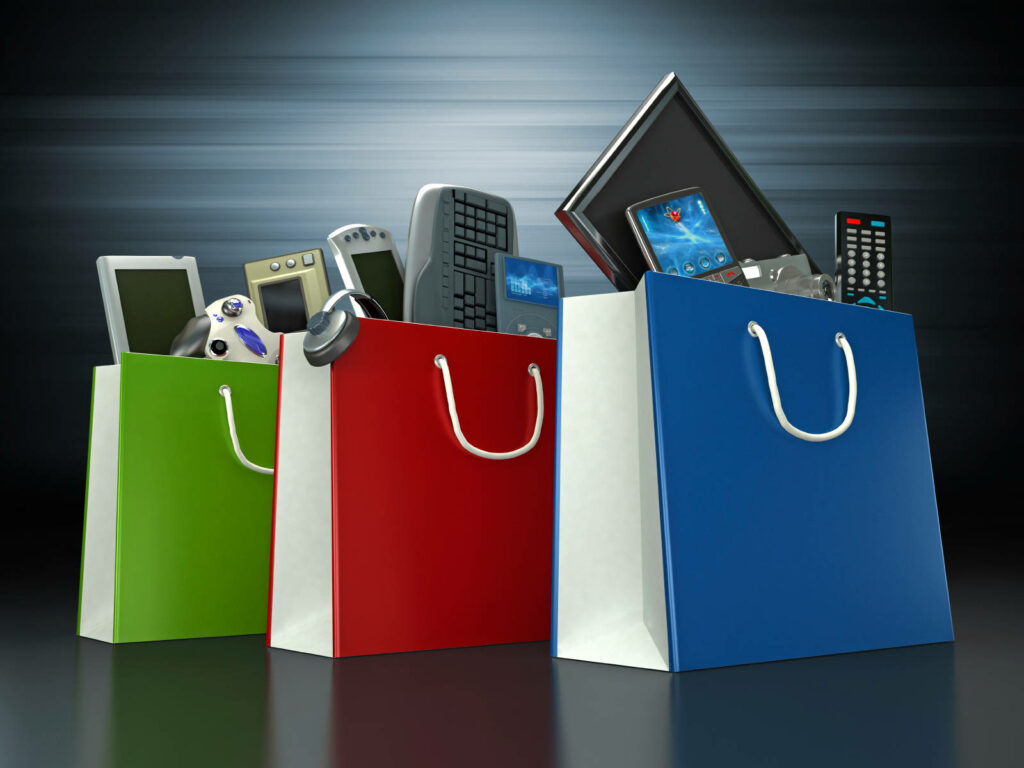 Vibrant Wallpaper: Colorful Shopping Bags with Electronics on Gradient