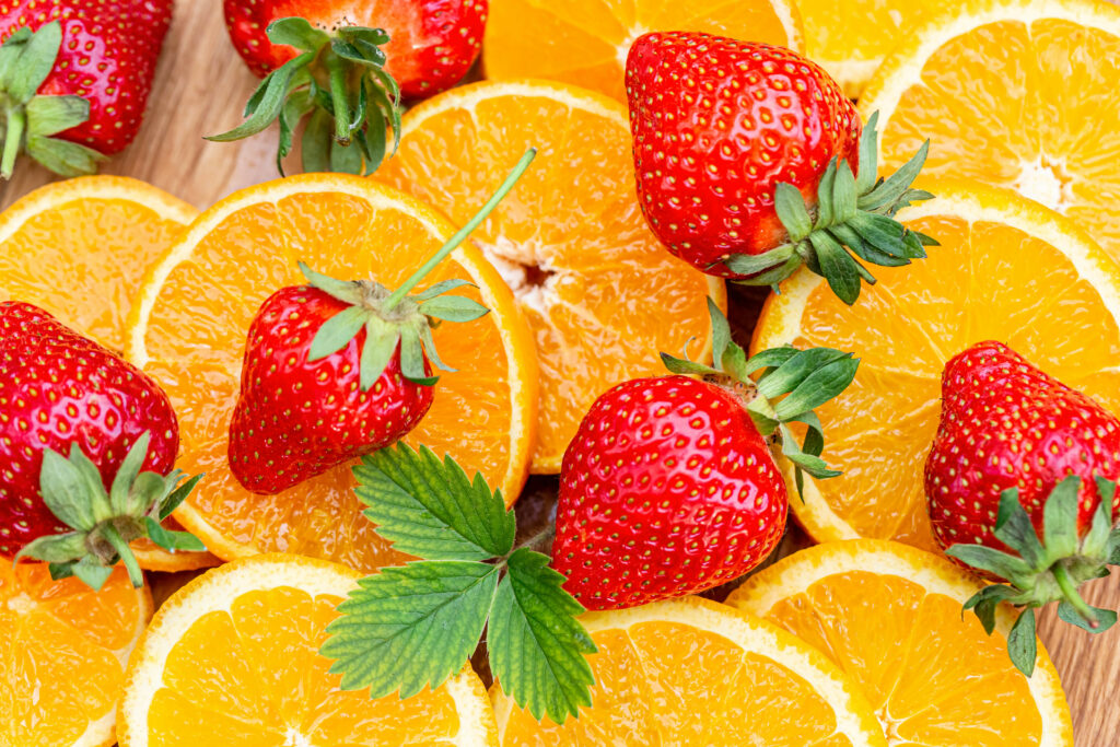 Vibrant Wallpaper: Fresh Strawberries & Orange Slices Background