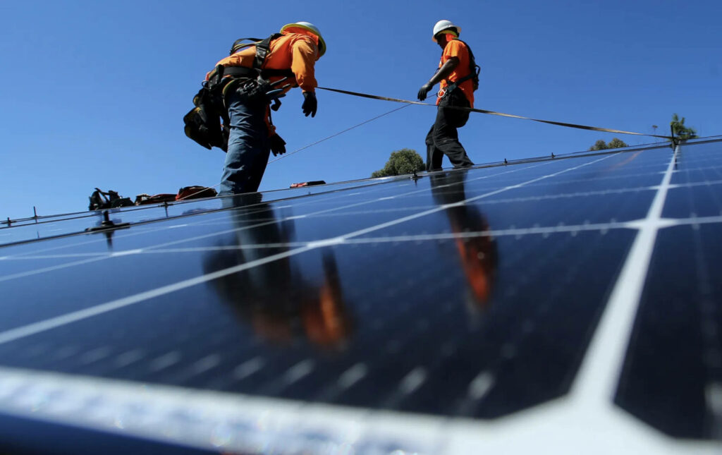 Vibrant Solar Panel Installation Wallpaper: Renewable Energy Focus