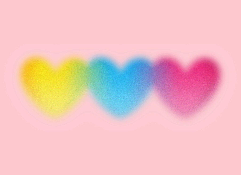 Glowing Hearts Wallpaper: Vibrant Yellow, Blue & Pink Aura Design