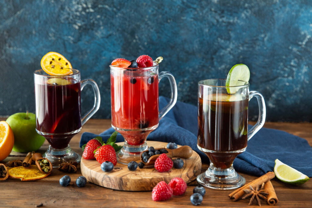 Colorful Beverage Wallpaper: Elegant Drinks with Fruits on Rustic Wood