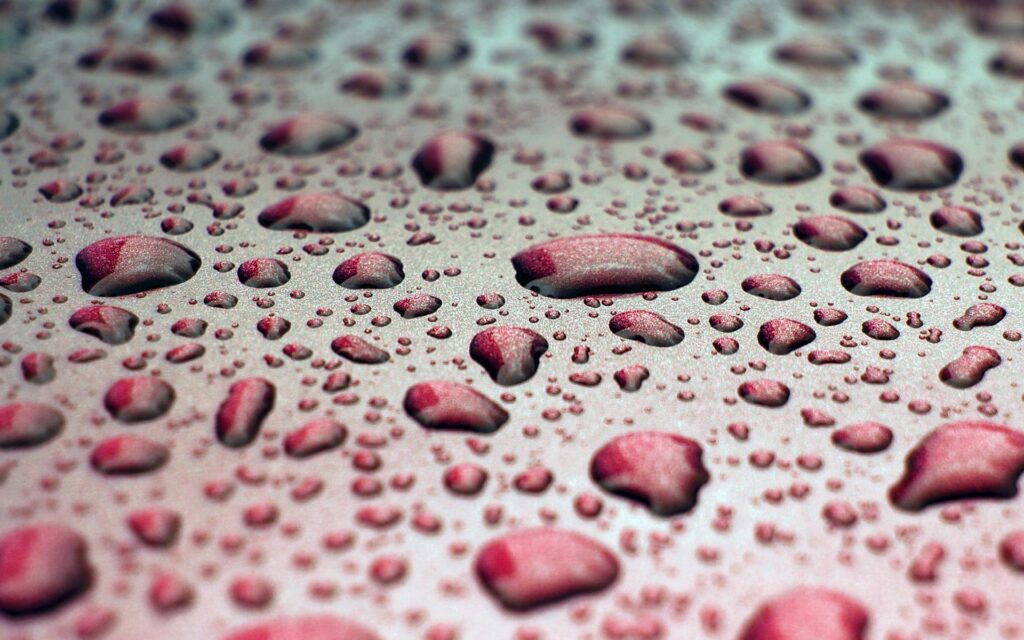 Vibrant Water-Drop Wallpaper: Artistic Close-Up Background
