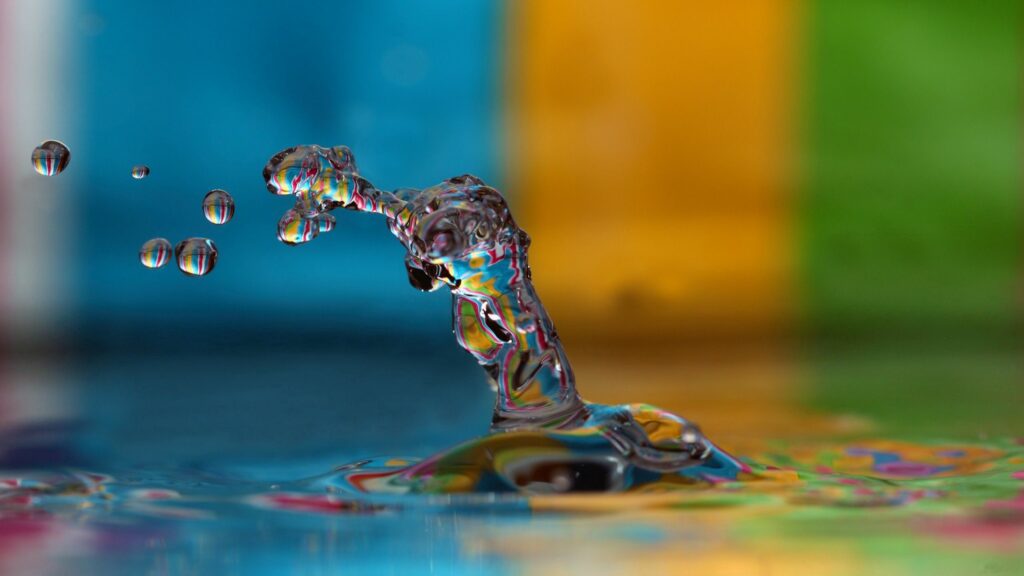 Colorful Water Droplets: Mesmerizing Patterns for Wallpaper Background