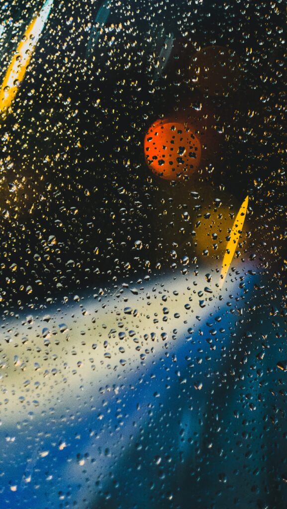 Vibrant Water Droplets Wallpaper with Colorful Light Play