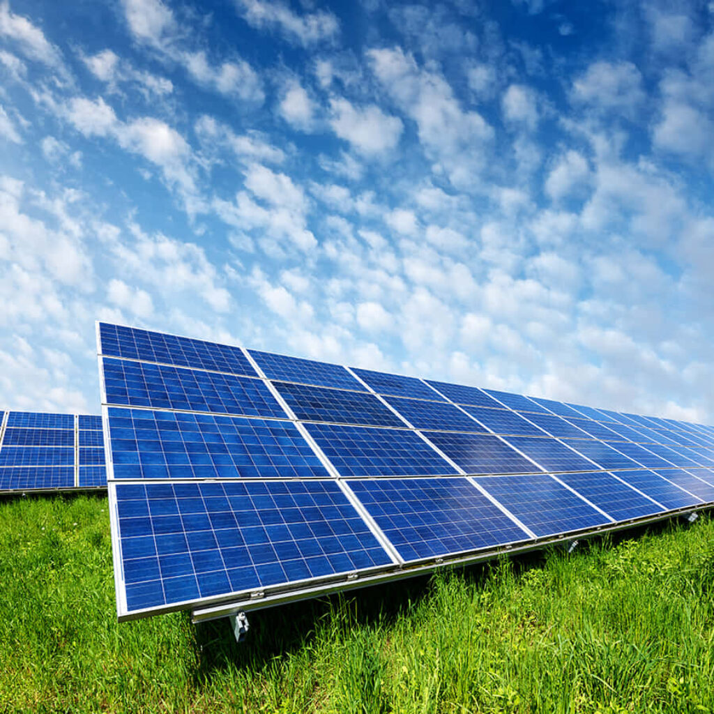 Vibrant Solar Panel Installation Wallpaper: Xcel Energy's Bright Sky View