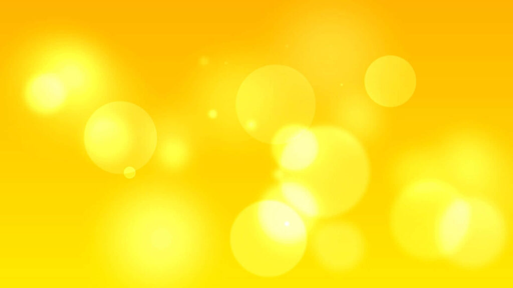Vibrant Yellow Abstract Wallpaper with Glowing Bokeh Circles