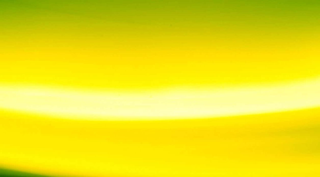 Vibrant Yellow Abstract Wallpaper with Smooth Gradients & Energy