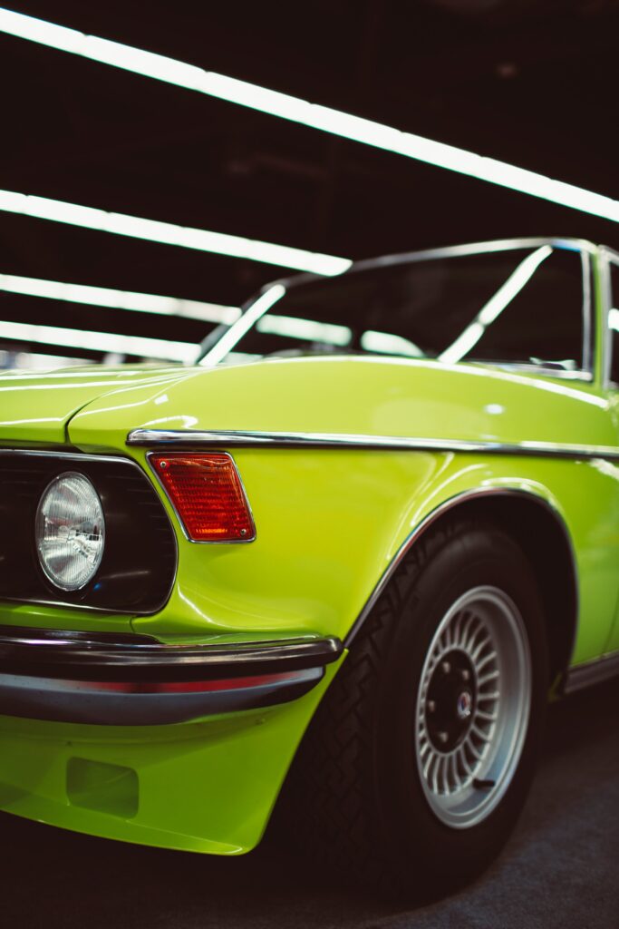 Sleek Yellow BMW 528i Side View: Classic Elegance Meets Sporty Appeal Wallpaper