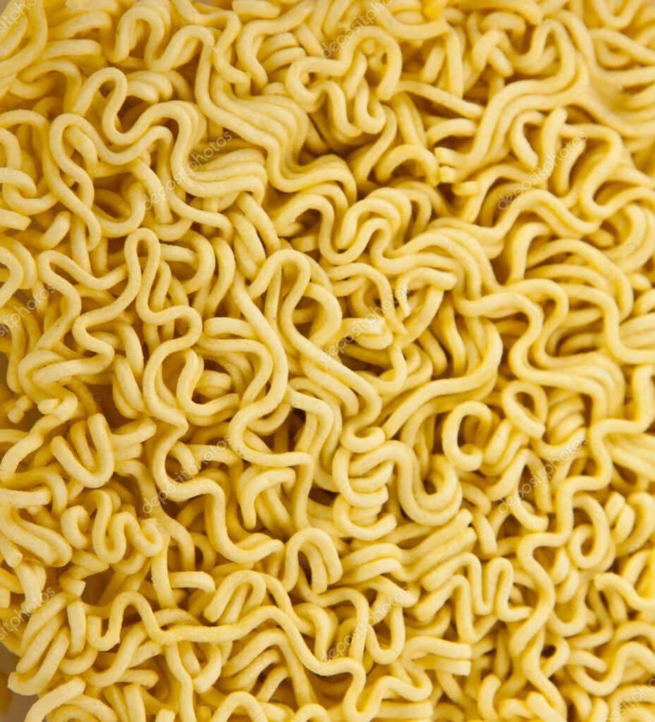Vibrant Yellow Boiled Instant Noodles Wallpaper Background