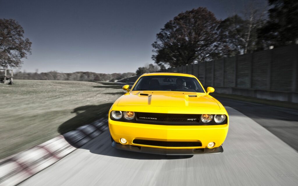 Vibrant Yellow Dodge Challenger SRT8 392: Power & Adventure Wallpaper